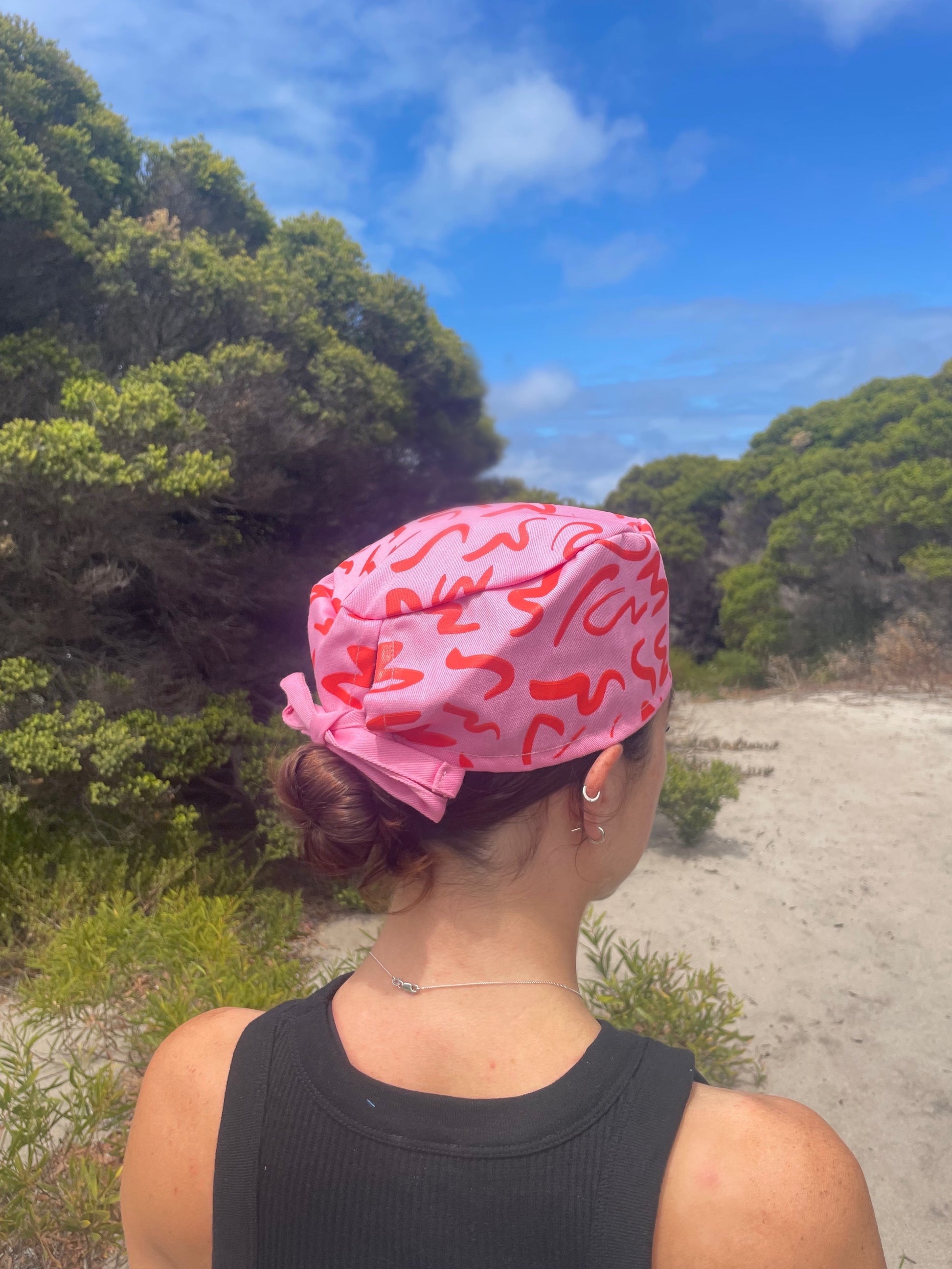 Pink & Red Wave Print Cotton Twill Scrub Cap™